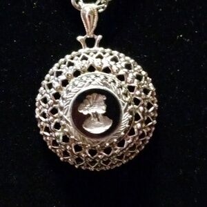 Beautiful vintage Cameo filigree necklace/watch with. 24"metal chain.